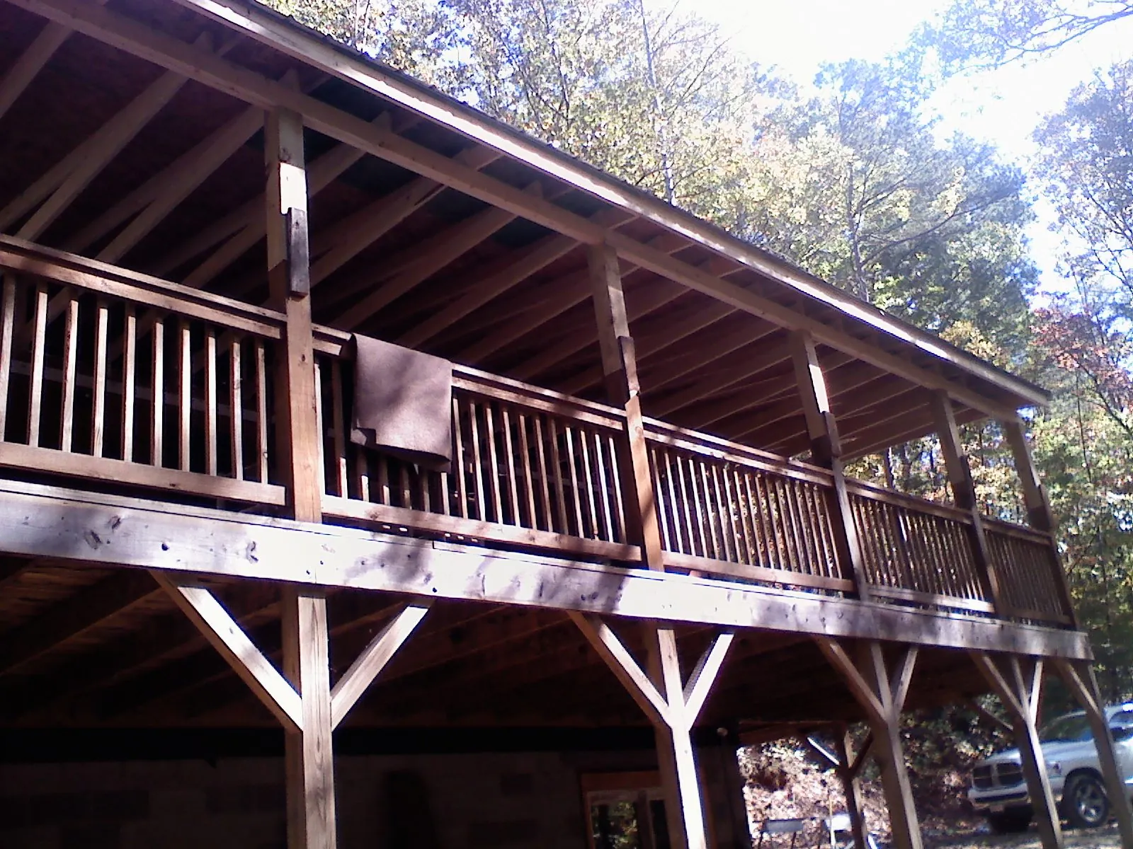 Timber framing under a new elevated porch and deck — Roof Leak Repair in Mosby by Roofing Brothers